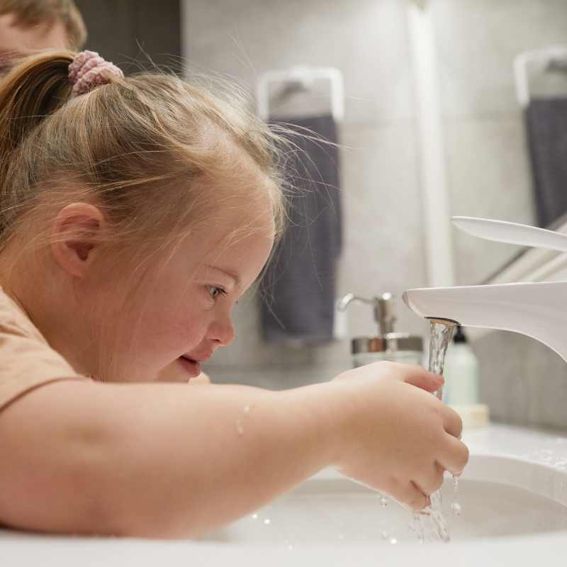 children learning body parts through movement in SEN EYFS classroom